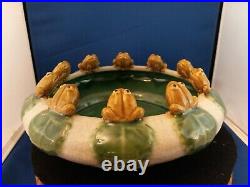 Vintage bowl with ten frogs on the rim